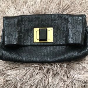 LV Montaigne leather clutch with gold hardware.